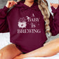 A Baby is Brewing Pregnancy Hoodie